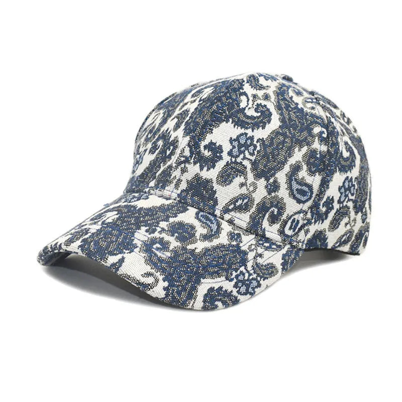 Polyester baseball cap with printed paisley pattern in blue colour showing dome crown design