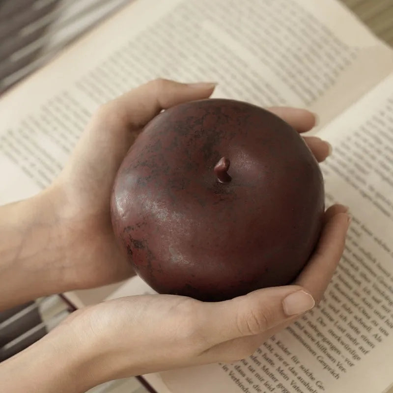 Retro Chinese style ceramic apple ornament for desktop decoration in large and small sizes.