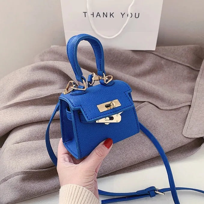 Mini one shoulder crossbody handbag, PU small square bag with lock closure, solid colour, front view