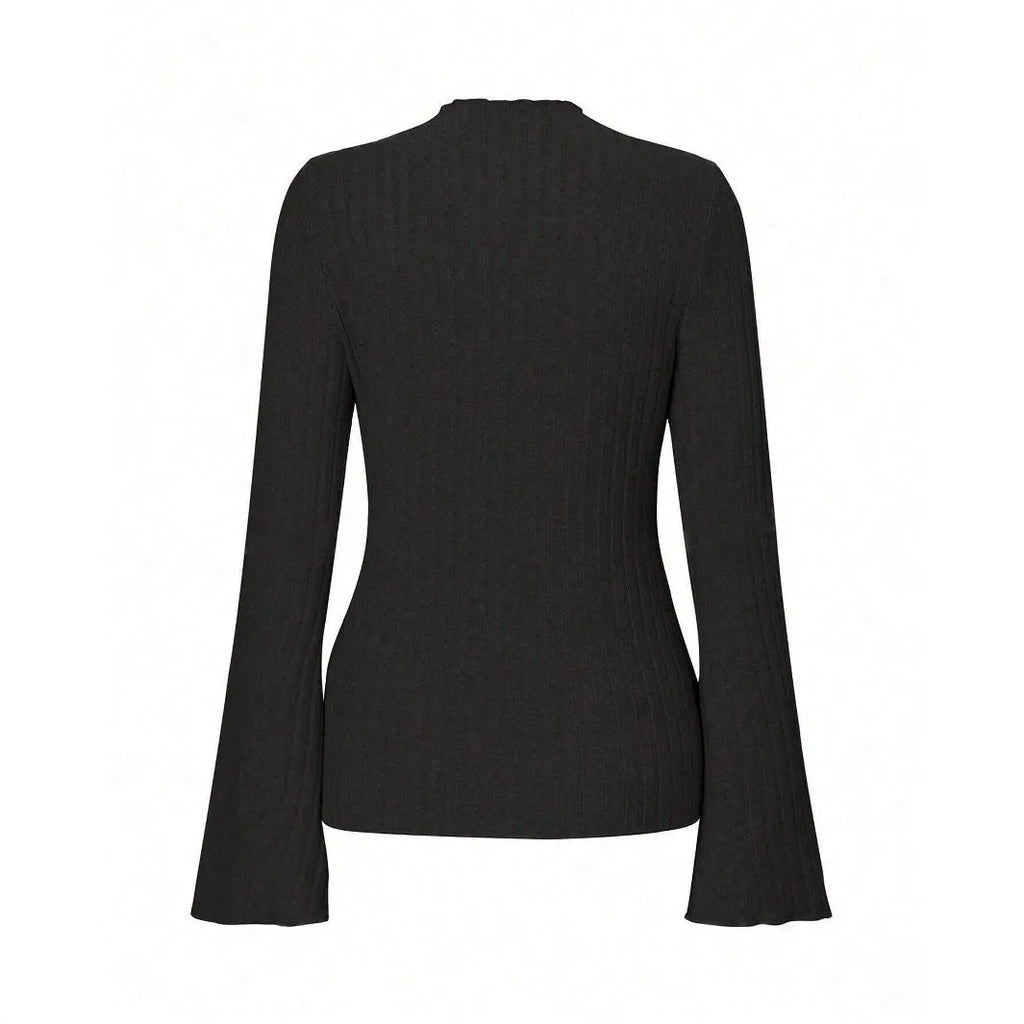 Long sleeve black top with lantern sleeves and sunken stripe texture, laid flat.