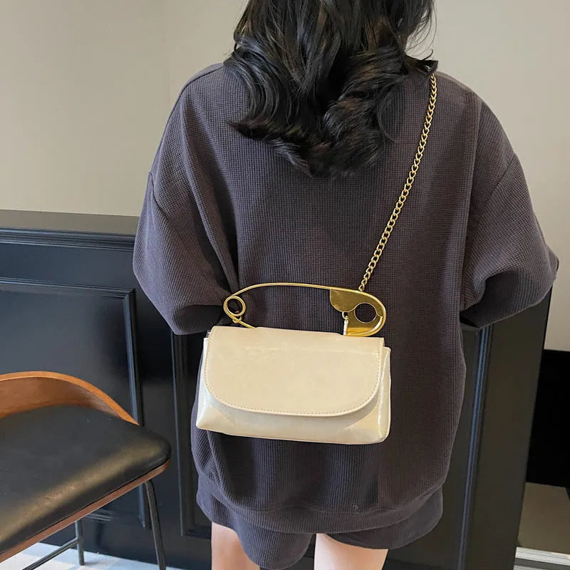 Creative paper clip design PU leather shoulder handbag in horizontal square shape with sandwich pocket
