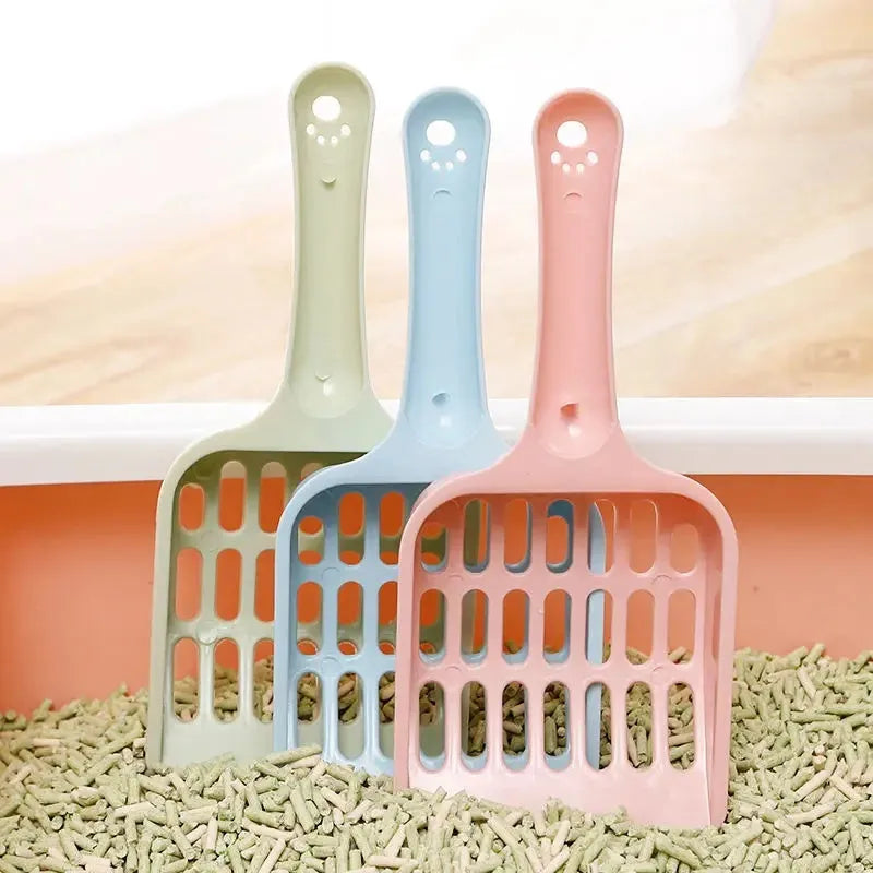 Blue plastic cat litter scoop showing 20cm length and 9cm width for pet tray cleaning