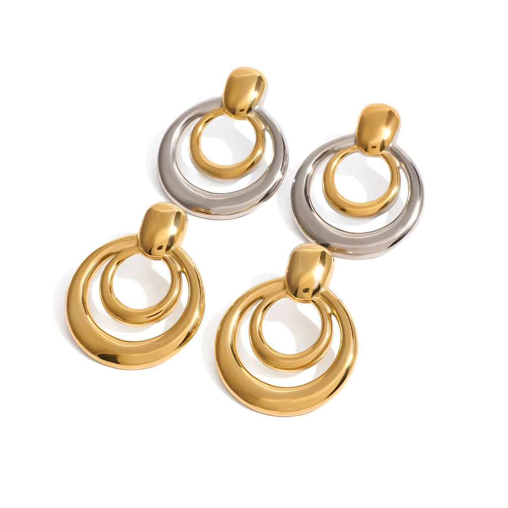 Golden titanium steel stud earrings with double-layer hollow design and round geometry shape