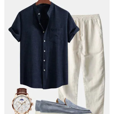 Men's blue slim-fit stand collar short-sleeved shirt with 3D digital printing, paired with trousers and shoes from the coordinated set.