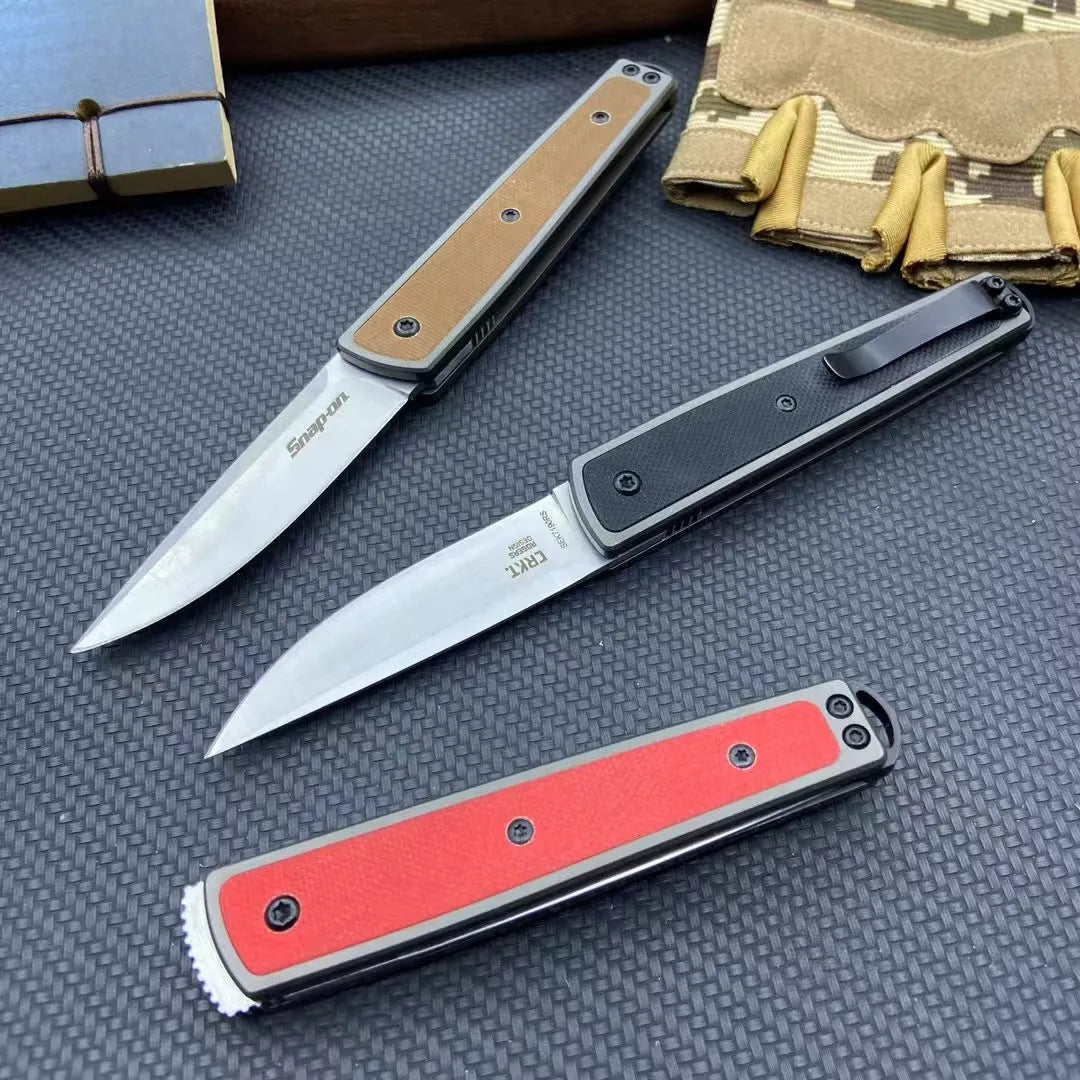 Folding fruit knife with stainless steel blade in black, brown, or red colour options showing 17cm length
