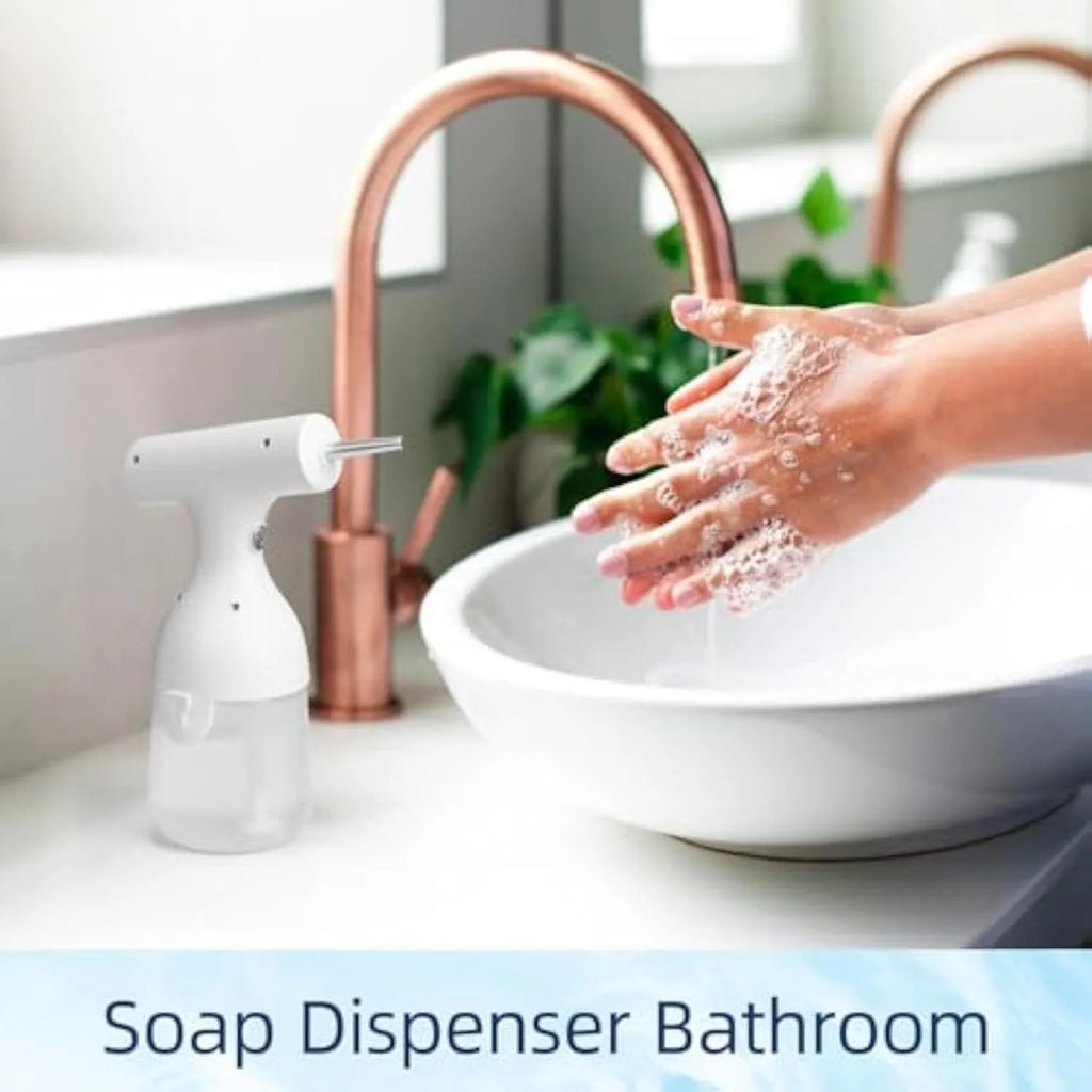 White electric foam soap dispenser with two nozzles and USB cable for pet and home cleaning.