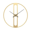Large round metal wall clock with Roman numerals on a white wall.