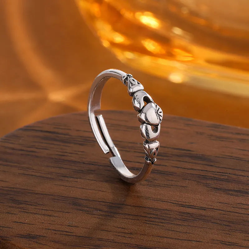 Retro silver heart-shaped open ring for women made from copper.