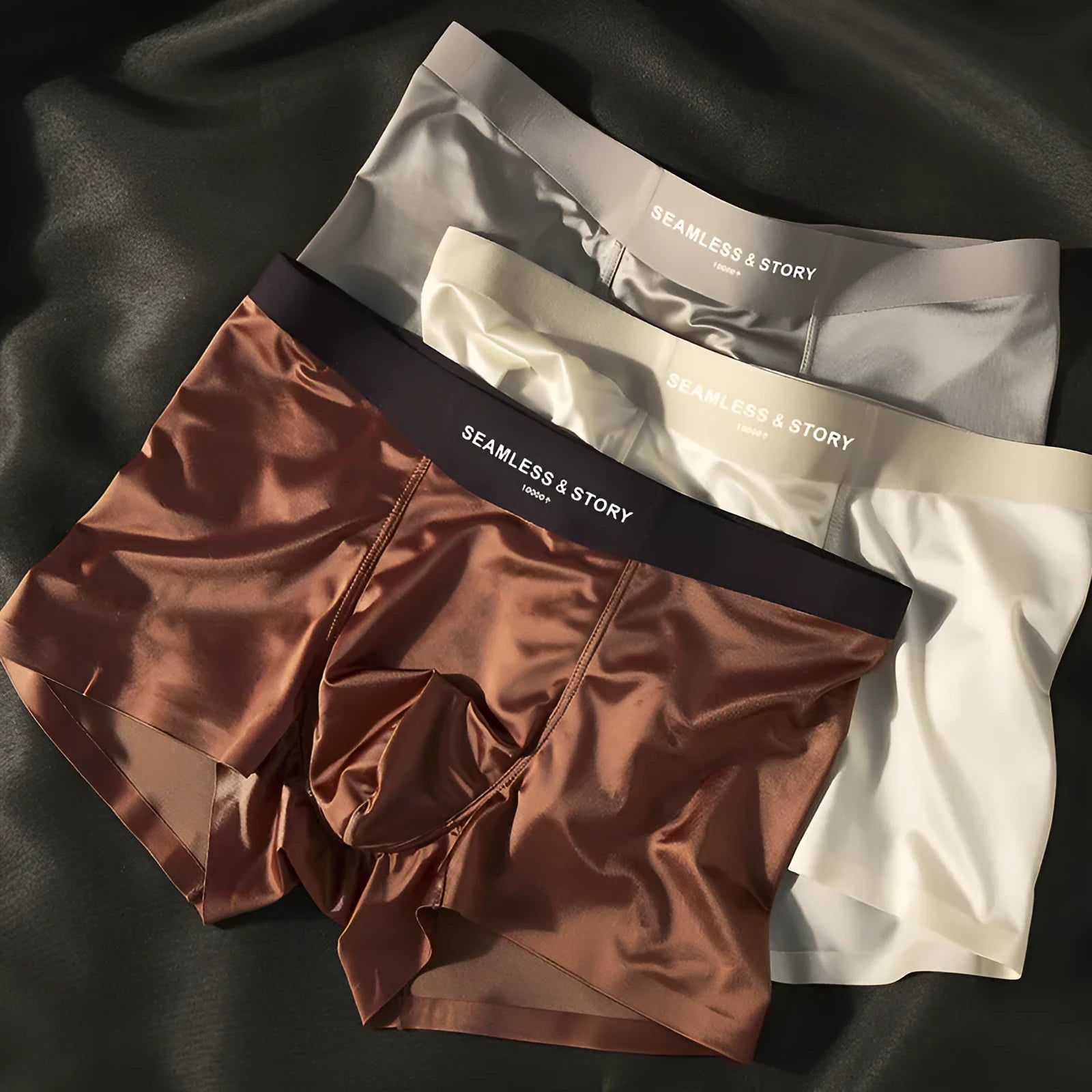 Men's ice silk underwear in multiple colours showing mid-waist design and smooth fabric texture