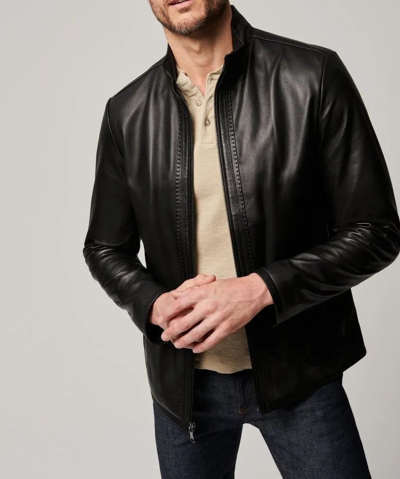 Black men's retro leather jacket with long sleeves and straight hem on a hanger