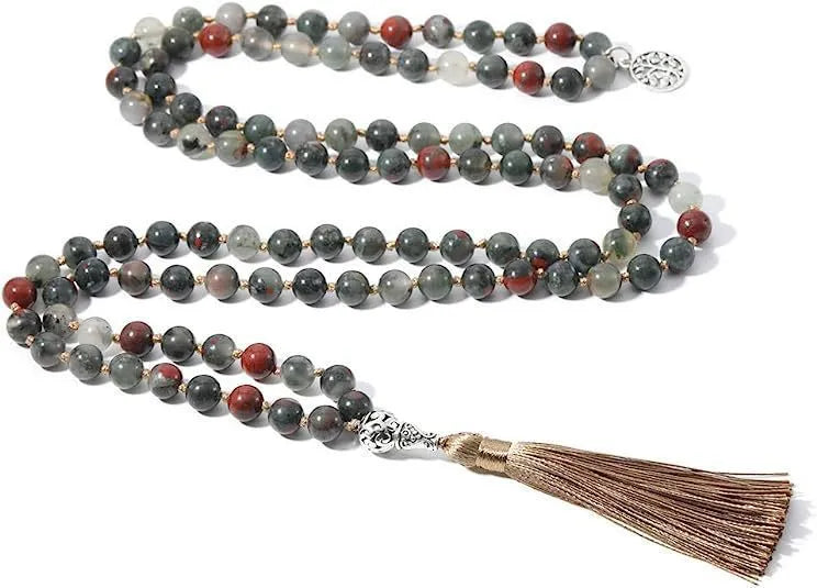 Handmade knotted stone bead necklace with 108 beads, showing geometric design and natural stone colours.
