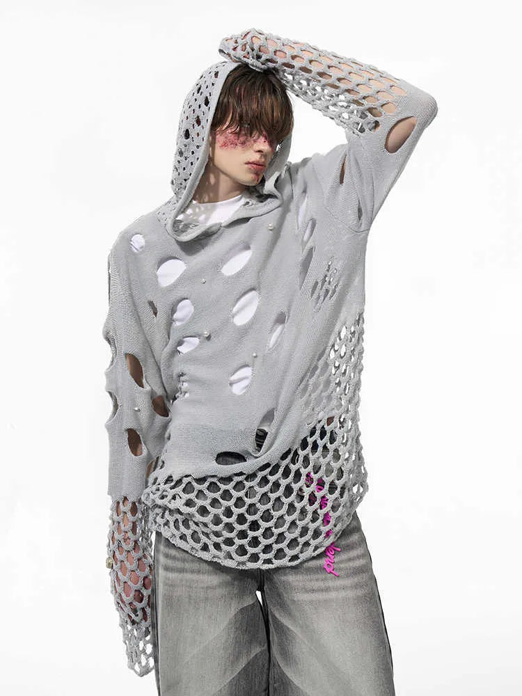 Men's black loose-fit hoodie with hollow hood design and pearl decorative trim on the front.