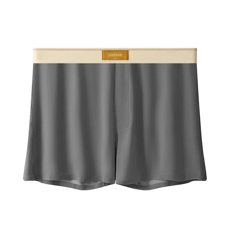 Men's solid colour ice silk underwear with a loose fit and mid waistband on a neutral background.
