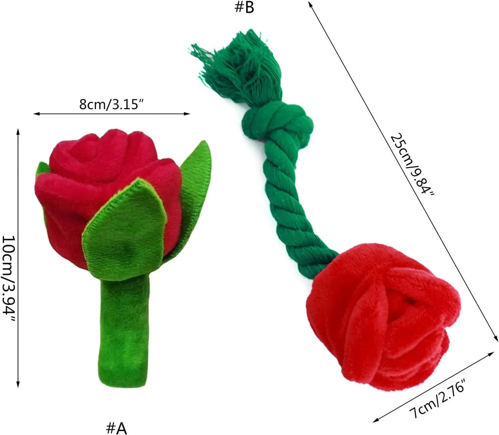 Plush pink rose flower dog chew toy with green leaf and a squeaker inside.