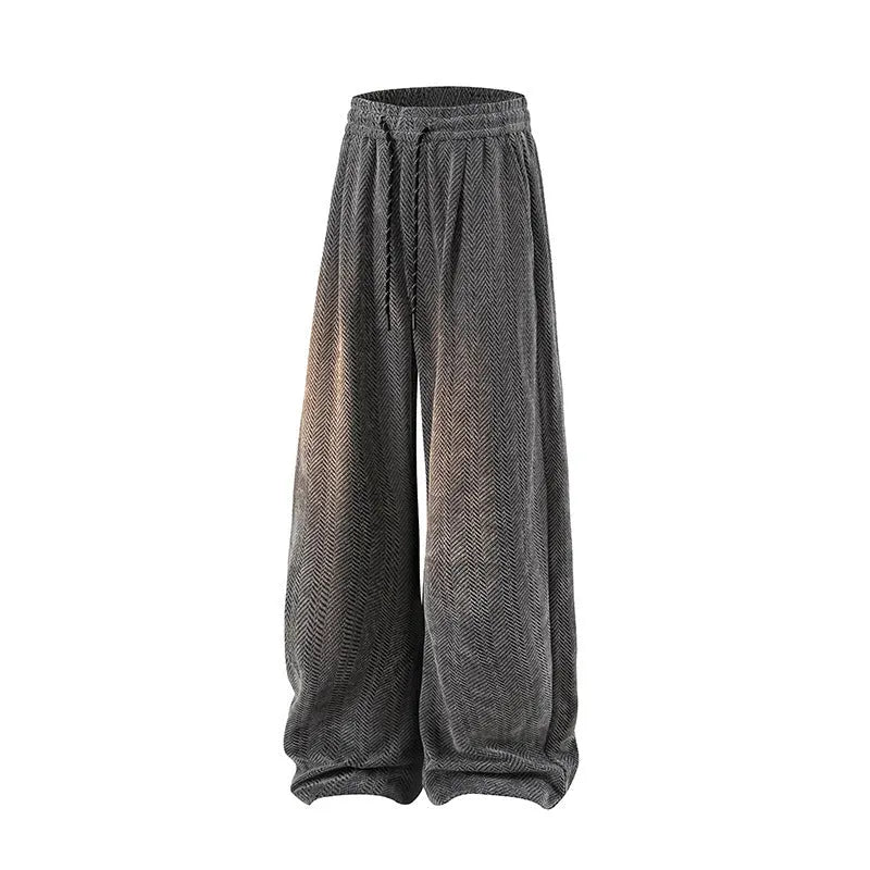 Man's straight-leg fleece-lined casual trousers in lightweight grey fabric with an elastic waistband.
