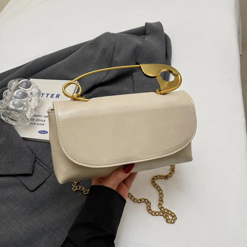 Creative paper clip design PU leather shoulder handbag in horizontal square shape with sandwich pocket
