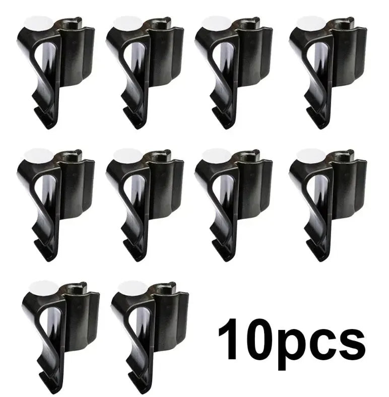 Black plastic golf putter fixing clip holder attached to a golf bag