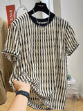 Men's black striped linen silk blend short sleeve shirt laid flat showing loose casual fit