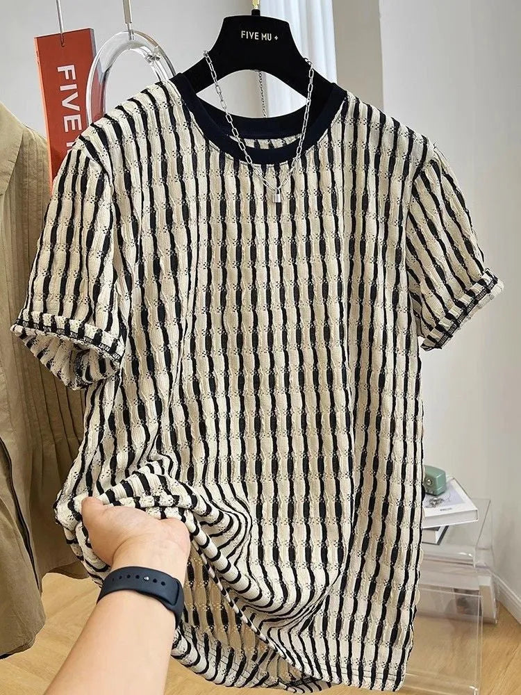 Men's black striped linen silk blend short sleeve shirt laid flat showing loose casual fit