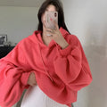 Watermelon red women's sleeveless hooded sweater made from mulberry silk fabric.