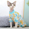 Hairless cat wearing cotton belly protector in lion pattern, two-legged style, size M