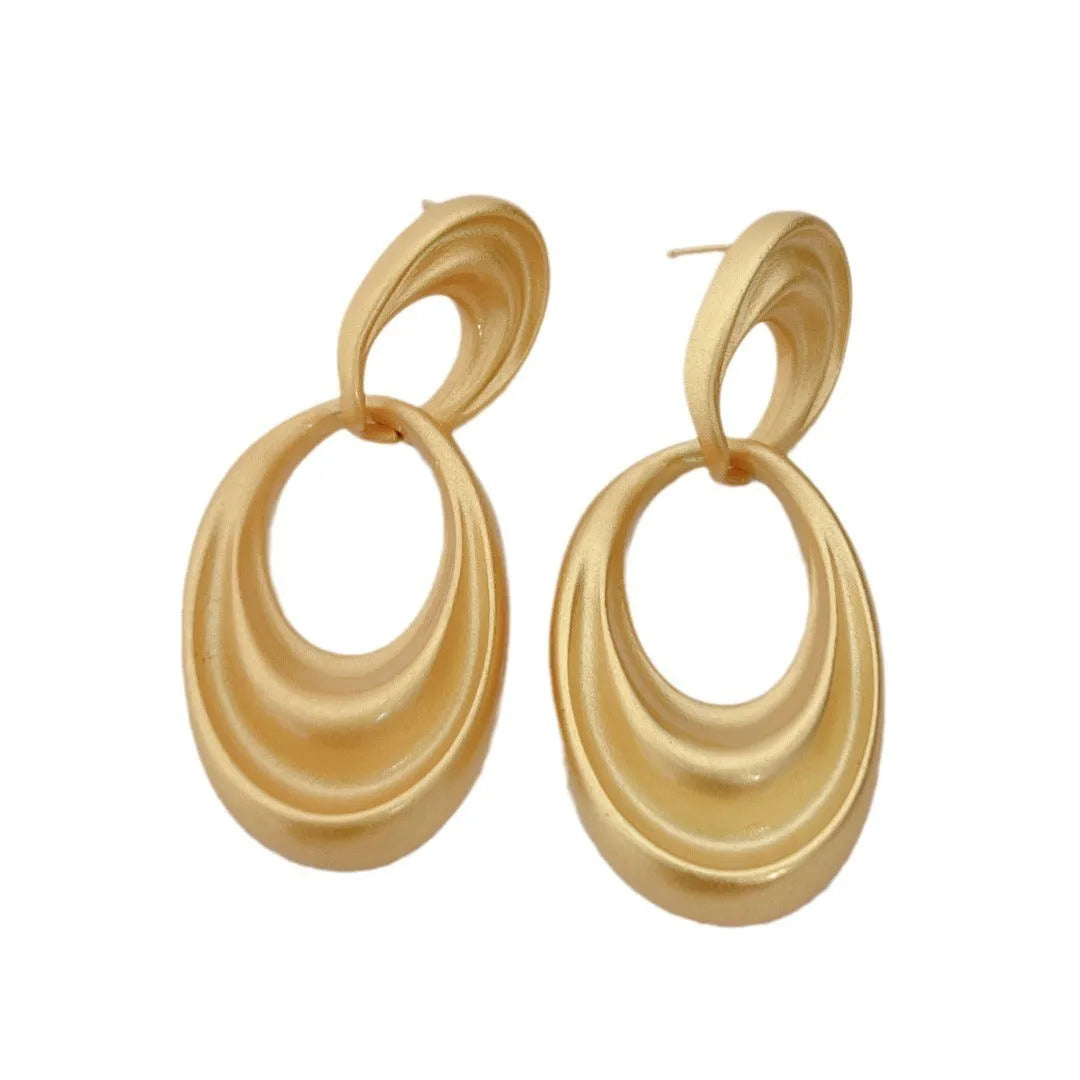 Double circle earrings with U-shaped silhouette in quicksand gold finish, retro French style