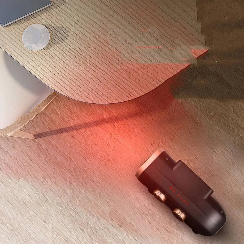 White and black gold portable electric ceramic fan heater with control dials on top.