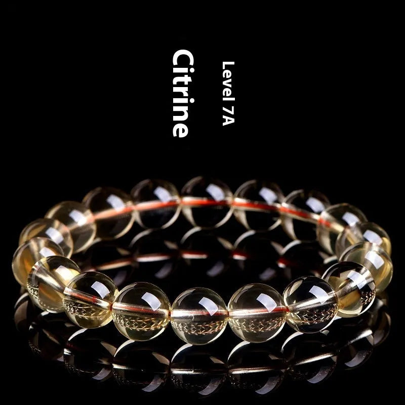 Natural citrine scattered beads ball bracelet showing golden polished stones on a wrist, available in 7A and 6A grades.