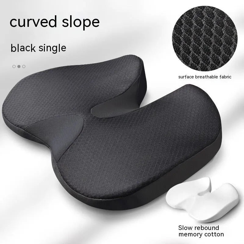 Curved wedge seat cushion for tailbone support in car, shown in beige colour with memory foam interior