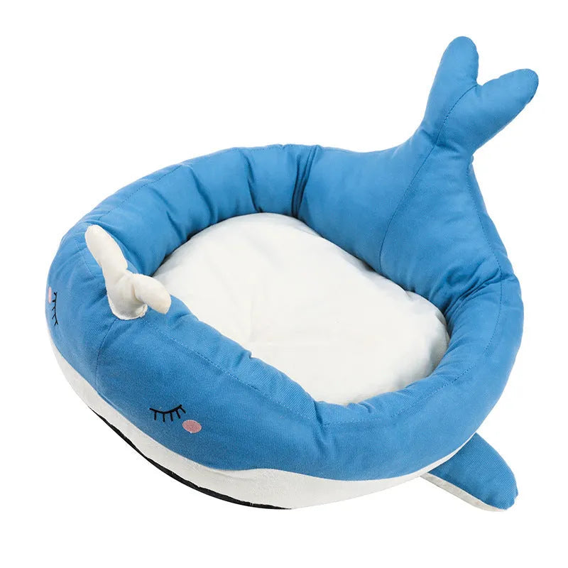 Blue duck-shaped fluffy pet bed sofa for small dogs and cats on wooden floor