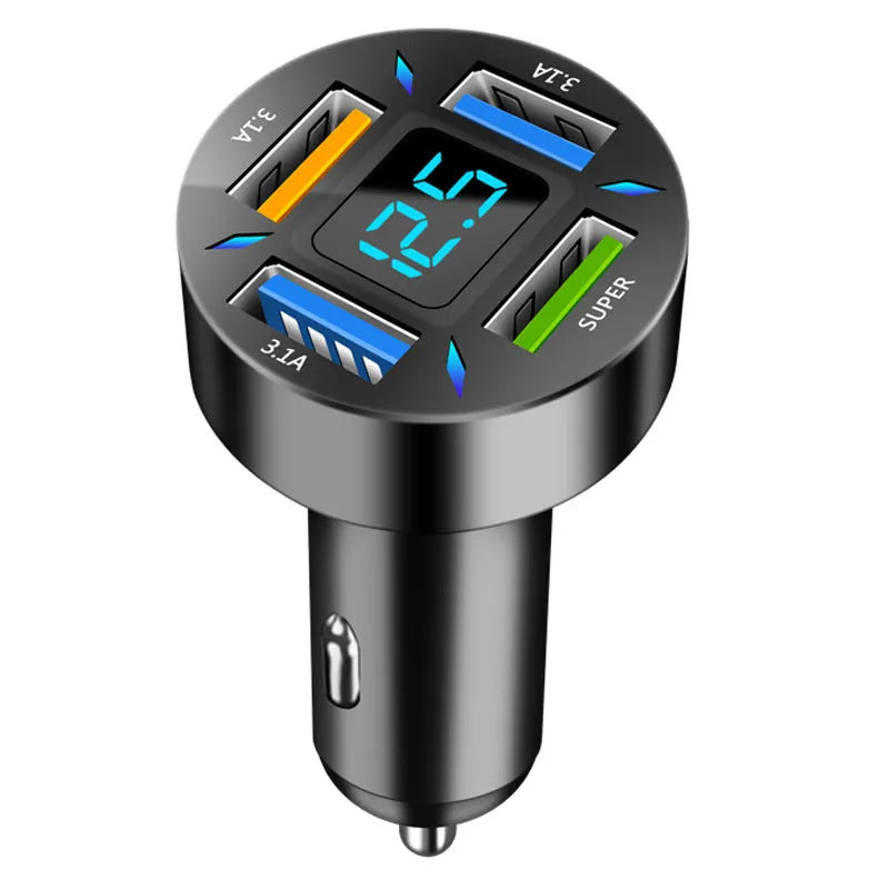 Black four-port USB car charger with LED voltage display plugged into a car socket.