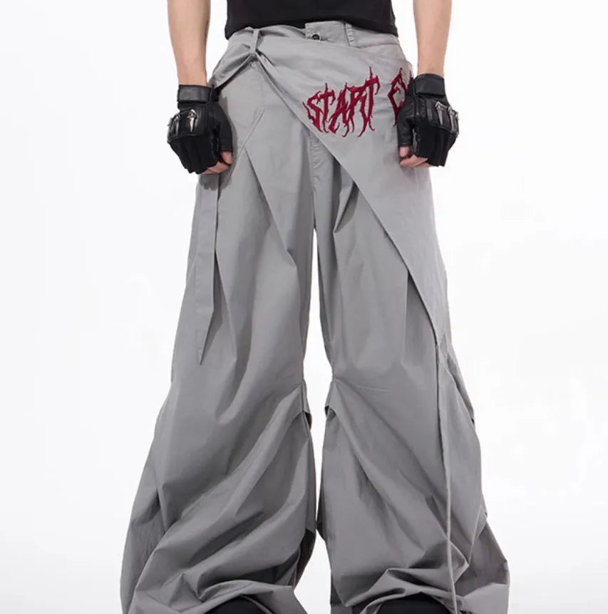 Boy modelling black wide-leg summer pants in a refined Korean style