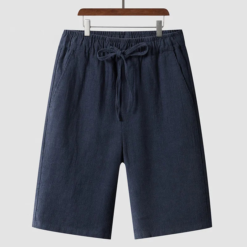 Men's linen shorts in loose cropped style with elastic waistband in various colours