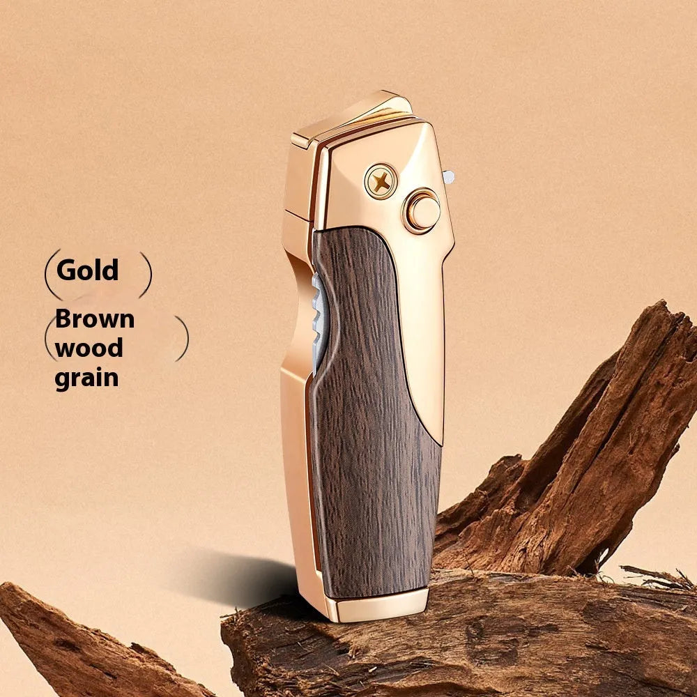 Closed metal folding lighter with integrated knife in a carbon fibre finish, showing the safety lock and refill valve.