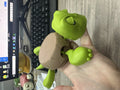 Turtle-shaped ABS plastic coaster in one of four colours: dark green, light green, wheat starch, or yellow.