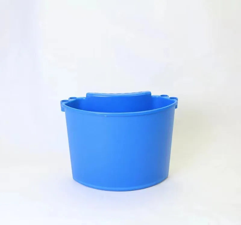 Coloured car wash bucket with a white grit guard insert inside for separating dirt.