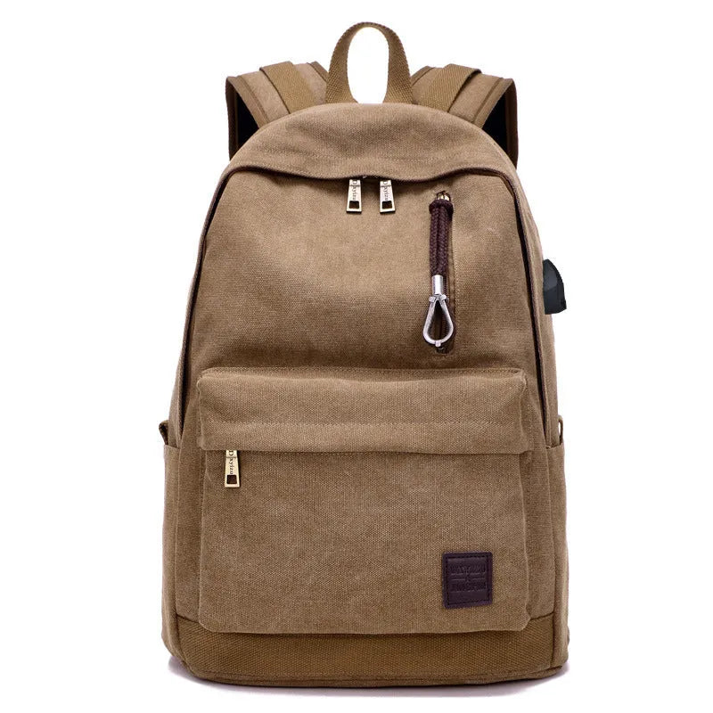 Canvas backpack with external USB charging port showing coffee colour option with multiple compartments.