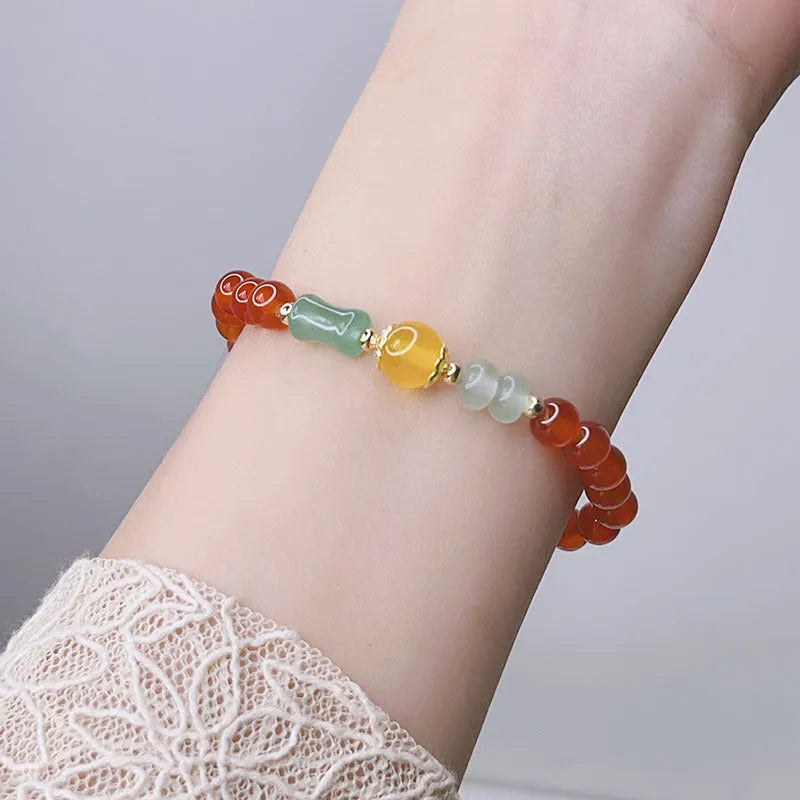 Chinese style red agate bracelet for women with dragon design, manual craftsmanship.