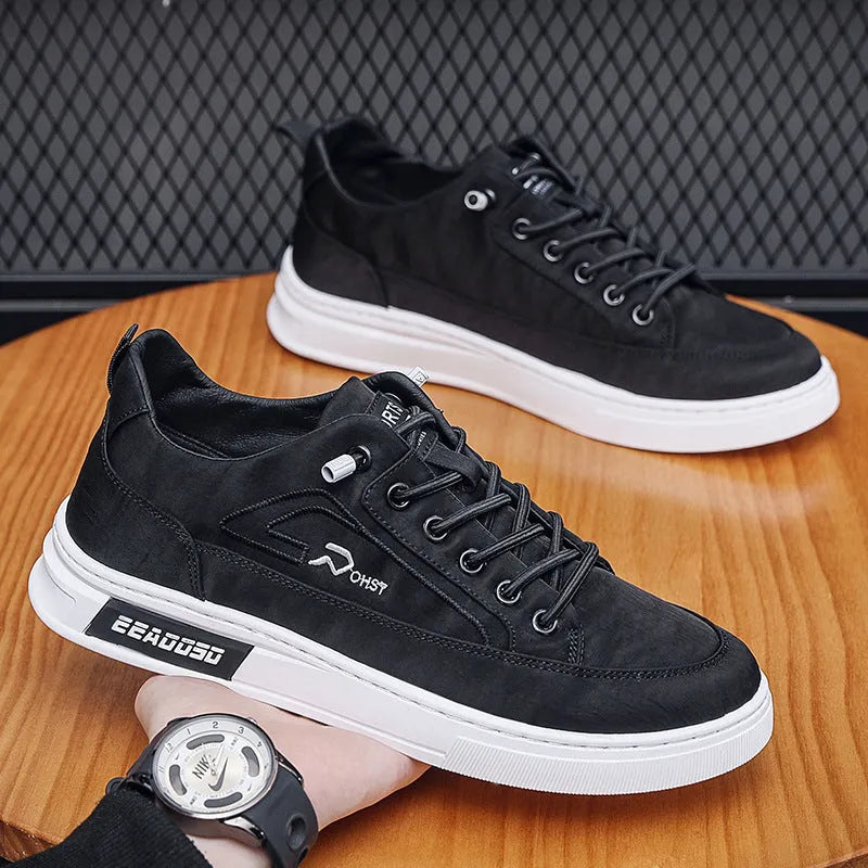 Men's grey canvas casual sneakers with round toe and low-top design featuring breathable ice silk fabric