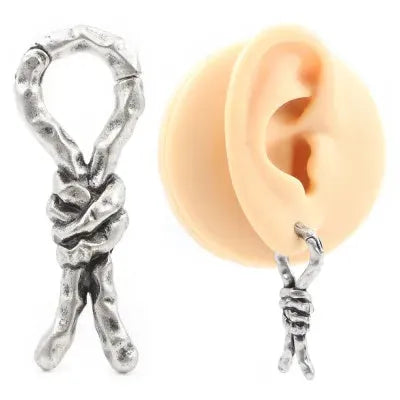 Close-up of 4mm copper bending and connecting earrings for auricle piercings.