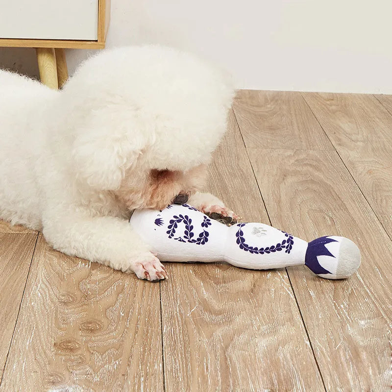 Red and white tequila bottle plush dog toy with squeaker, 26cm tall