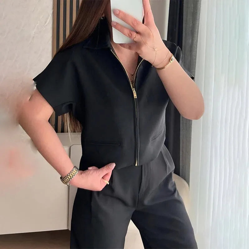 Loose-fit short-sleeve polyester casual top on a hanger, shown in white, black, and yellow colour options.