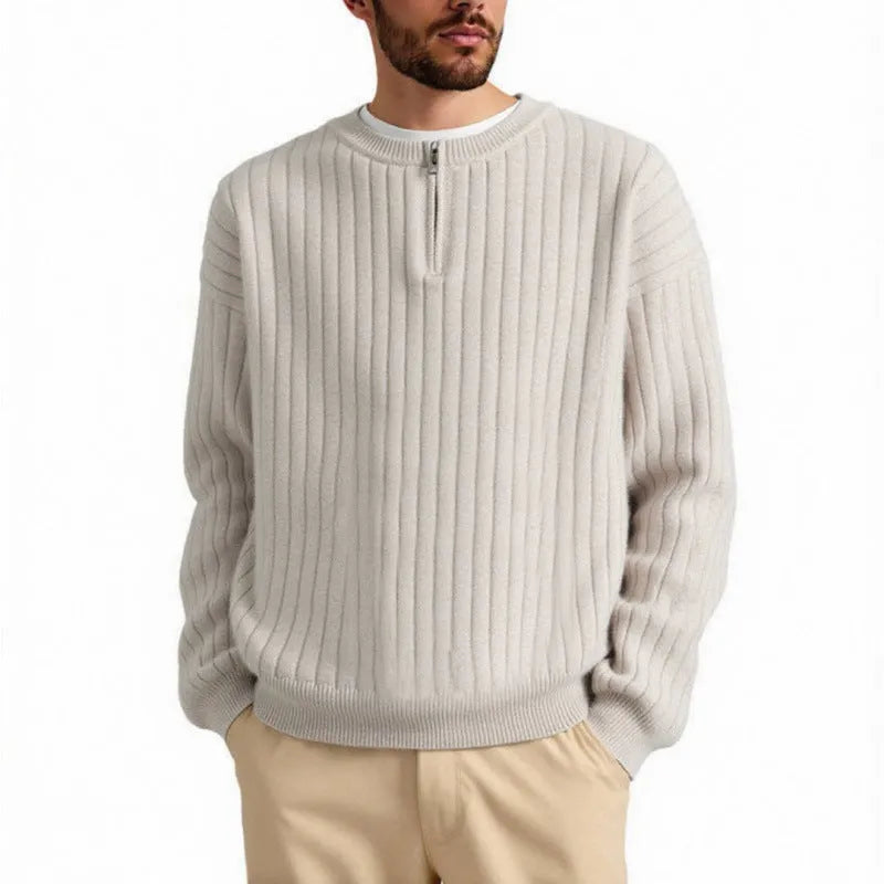 Grey men's loose fit half zip pullover sweater with textured knit and long sleeves.