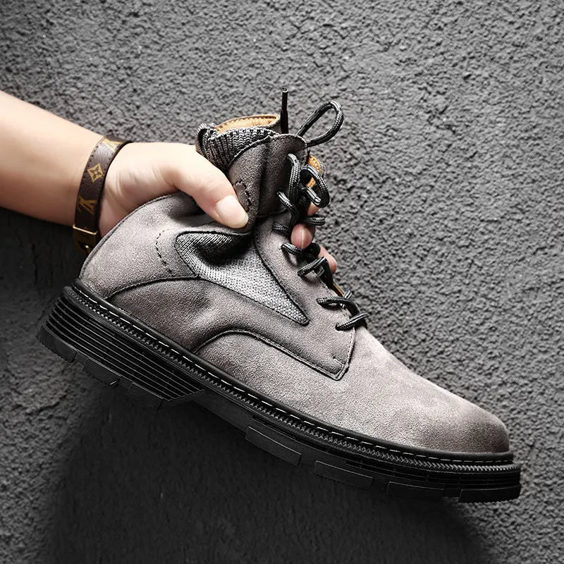 Men's ankle-high Martin boots in frosted sand leather with thick rubber sole and round toe.