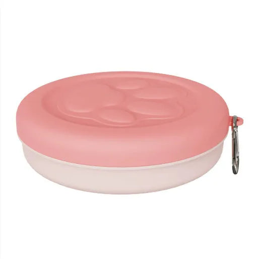 Portable dual-colour dog bowl set with attached snack box in light green and pink.