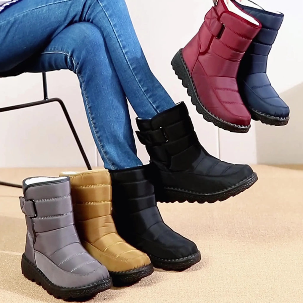 Women's waterproof snow boots with canvas upper, PU sole, buckle closure, and belt decoration