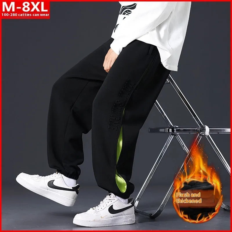 Men's loose cotton trousers with stitching detailing and ankle banding in grey green colour