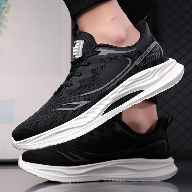 Men's solid colour casual shoe with a woven mesh upper and a low rubber sole.