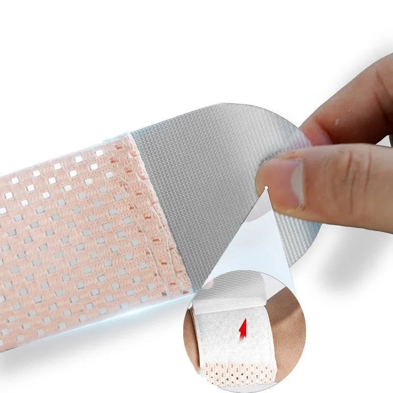 Athletic wristguards in black, gray, and pink colours showing elastic breathable fabric construction