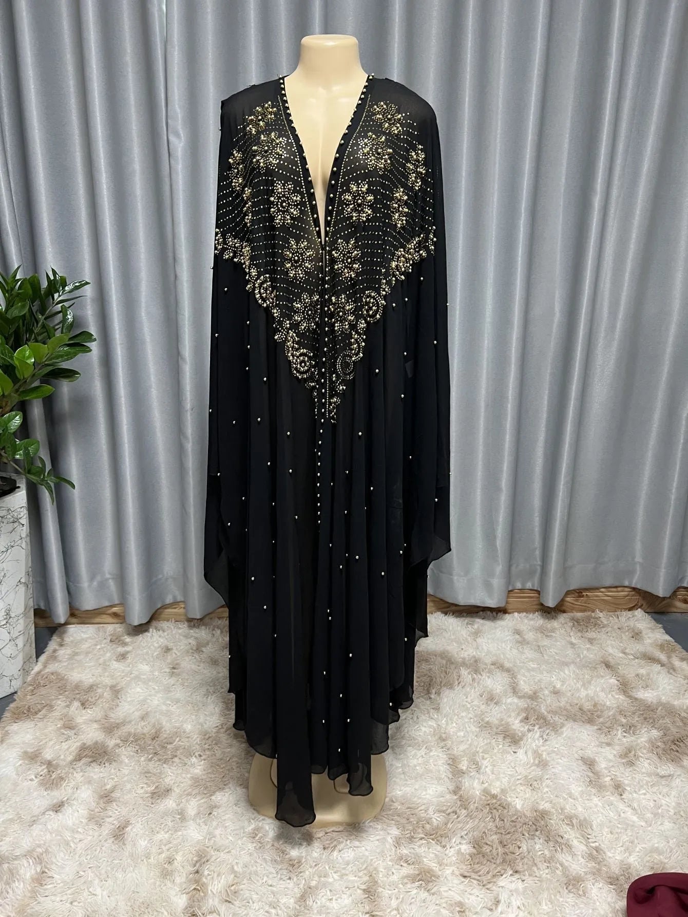 Long purple chiffon shawl with rhinestone beading, draped to show length and detail.